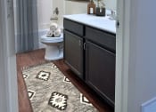 Thumbnail 12 of 12 - a bathroom with a shower and a sink and a toilet