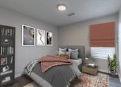 Thumbnail 2 of 35 - A bedroom with a bed, a nightstand, a bookshelf, and a plant.