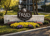 Thumbnail 2 of 25 - The sign in front of the building says "The Trails at River Road".