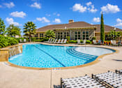 Thumbnail 50 of 61 - A large swimming pool with a sign that says "NO DIVING" in front of a house.