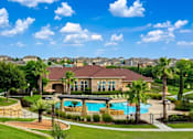 Thumbnail 59 of 61 - A large house with a pool in the backyard.
