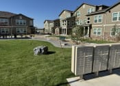 Thumbnail 63 of 65 - a group of mailboxes in front of an apartment complex