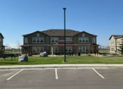 Thumbnail 62 of 65 - a large house with a street light in front of it