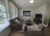 Thumbnail 5 of 31 - a small living room with a couch and two chairs at The Courts Midtown, Memphis, TN, 38104