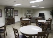 Thumbnail 5 of 22 - A conference room with a table and chairs.
