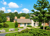 Thumbnail 3 of 4 - A residential area with houses and greenery.