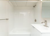 Thumbnail 10 of 23 - Babcock Tower bathroom with bright finishes.