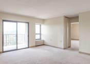 Thumbnail 9 of 23 - Babcock tower apartment with carpeting white finishes and balcony