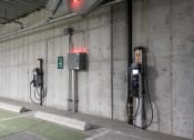 Thumbnail 21 of 25 - a row of gas pumps in a parking garage