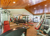 Thumbnail 13 of 28 - Kimball court fitness center with equipment and cardio machines