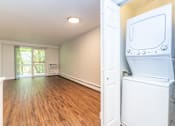 Thumbnail 20 of 28 - an empty laundry room with a washer and dryer in it