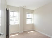 Thumbnail 17 of 20 - bedroom with closet and carpet floor
