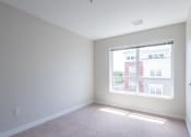 Thumbnail 10 of 20 - bedroom with carpeted flooring