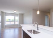 Thumbnail 15 of 20 - large open living space with wide windows