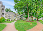 Thumbnail 12 of 19 - Landscaped Walkway  at Station Pointe Apartments, Massachusetts, 02048