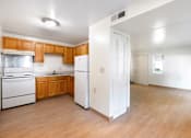 Thumbnail 9 of 12 - Open concept kitchen and living area at Blue Ridge Estates Apartments, Richmond, Virginia