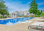 Thumbnail 12 of 16 - our apartments have a large swimming pool and lounge chairs at Blue Hills Village, Canton, Massachusetts