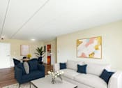 Thumbnail 2 of 15 - A living room with a blue couch and a white couch at Edmands House, Massachusetts, 01701