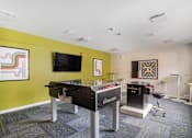 Thumbnail 8 of 19 - A games room with a pool table and a television at Station Pointe Apartments, Mansfield, MA, 02048