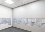 Thumbnail 9 of 17 - A row of white mailboxes on a wall at Edmands House, Framingham, 01701