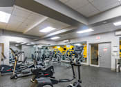Thumbnail 8 of 17 - A gym with treadmills and exercise equipment at Edmands House, Framingham, 01701