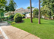 Thumbnail 5 of 12 - Modern apartment building with lush lawn at Blue Ridge Estates, Virginia, 23225