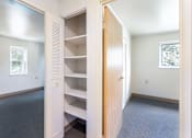 Thumbnail 8 of 12 - Bedroom closet with built in shelving at Blue Ridge Estates Apartments, Virginia, 23225