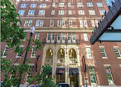 Thumbnail 14 of 14 - a tall brick building with cars parked in front of it  at 140 Clarendon, Boston, MA