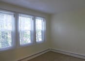 Thumbnail 2 of 12 - Living Room With Window at Conway Court, Roslindale, MA