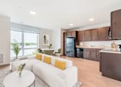 Thumbnail 9 of 14 - Kitchen, dining, and living room in Leefort Terrace, Salem, MA