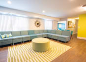 Thumbnail 7 of 9 - Community  living room at The Belt Atlantic Apartments, Virginia