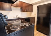 Thumbnail 4 of 9 - Renovated Kitchen at The Belt Atlantic Apartments, Richmond, 23224
