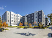 Thumbnail 8 of 12 - Exterior Street at The Anne M. Lynch Homes at Old Colony, South Boston, Massachusetts