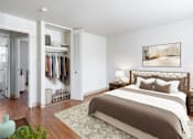 Thumbnail 5 of 16 - Large Bedroom with Closet and Wood Like Flooring at Georgetowne Homes Apartments, Hyde Park