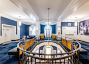 Thumbnail 1 of 14 - the interior of a building with a circular staircase and blue walls and white ceilings  at 140 Clarendon, Massachusetts, 02116