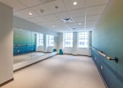 Thumbnail 6 of 14 - a large room with a large window and a blue wall  at 140 Clarendon, Boston, MA, 02116