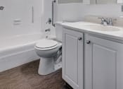 Thumbnail 7 of 14 - One bedroom apartment bathroom at Rockingham Glen in West Roxbury, MA