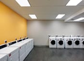 Thumbnail 10 of 15 - Laundry suite at Edmands House, Framingham, MA
