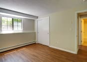 Thumbnail 8 of 14 - Bedroom with hardwood at Mansfield Meadows Apartments in Mansfield, MA