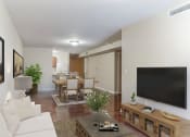 Thumbnail 3 of 12 - a living room with a large tv on the wall and a dining room table in the background at 13 State Street, Schenectady NY