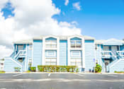Thumbnail 13 of 14 - Colorful Buildings at Fishermans Landing Apartments in Ormond Beach, FL.