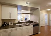 Thumbnail 1 of 15 - Kitchen at Ocean Shores Apartments in Marshfield, MA