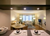Thumbnail 2 of 15 - Open kitchen to living room at Ocean Shores Apartments in Marshfield, MA