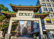 Thumbnail 7 of 8 - A Chinese archway with the word Chinatown written on it.
