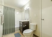 Thumbnail 6 of 6 - Bathroom With Bathtub and Updated Vanity.