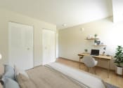 Thumbnail 5 of 6 - Bedroom with Closets and Desk.
