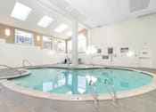 Thumbnail 7 of 14 - A large indoor swimming pool with a glass bottom. at Ship's Watch Apartments, Fall River, MA, 02720