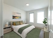 Thumbnail 11 of 12 - A bedroom with a large bed and a painting on the wall. at The Anne M. Lynch Homes at Old Colony, South Boston, MA