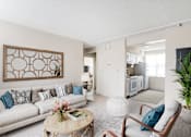 Thumbnail 1 of 17 - With Couches And View Into Kitchen  at Lenox Apartments, Boston, Massachusetts
