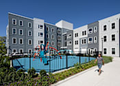 Thumbnail 9 of 12 - Pool View at The Anne M. Lynch Homes at Old Colony, South Boston, Massachusetts